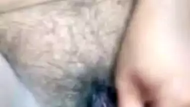 Fat Indian aunty fucks her own hairy twat with the new sex toy