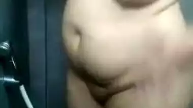 Busty Desi wife shakes her big XXX butt in amateur shower sex video