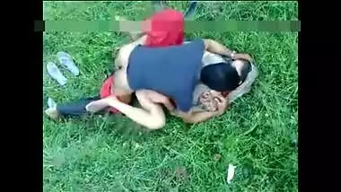 Green grass is perfect for Indian couple to practice porn action on it