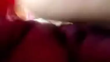 Plump amateur Desi wife in a red sari performs hot XXX striptease