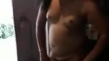 Joyful Desi girl shakes small XXX tits while dancing completely naked