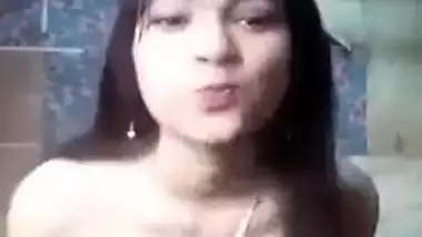 Long-haired Desi teen poses naked to show perfect XXX tits and pussy