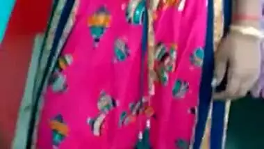 Hot like hell Desi female in sexy pink dress poses for the camera