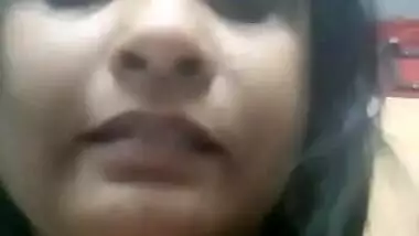 Desi bhabi self boobs press and licking boobs and her own finger selfie clip for lover