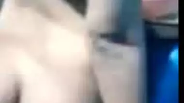 Busty Desi wife poses naked teasing with her XXX curves in MMS video