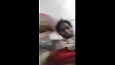 Indian whore sits on the floor and fingers her twat in amateur porn