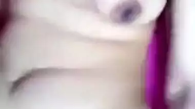 XXX whore shows off naked tits and then puts the camera down there