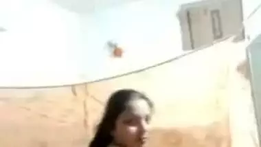 Sexy housewife strips and shakes her big Desi booty for the camera