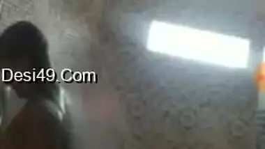 Indian girl takes a shower but she isn't going to interrupt video call