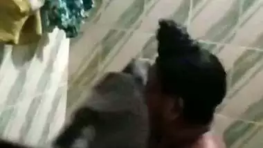 Mature aunty in bathroom taking nude bath caught