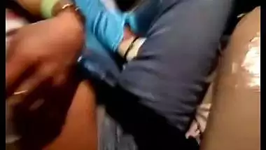 Outdoor sex of a guy sucking a girl’s boobs in a car