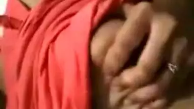 Pink T-shirt is pulled up so Indian sex girl can boast about her XXX tits