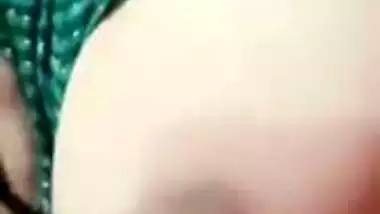 Stripchat girl Trisha playing with naked boobs