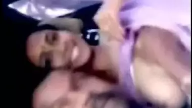 Self-made porn video by Indian guy licking large boobs while driving a car