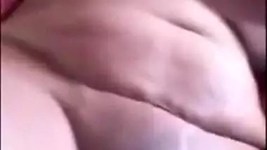 Indian chick in a red robe bares her natural XXX breasts to the sex fan