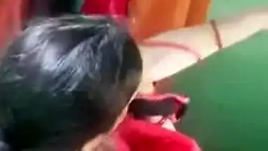 Female wears a yellow Indian sari after flashing her charms in voyeur porn video