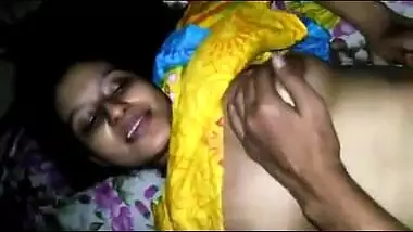 Guy touches Indian babe's boobs having oral sex in front of the camera