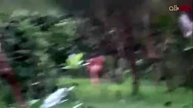 Two hot and sexy Desi aunty bathing in a outdoor under rain together