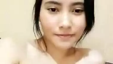 Tits of the Indian kitty in a red dress will make spectators horny