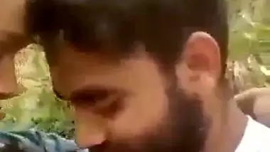 Indian outdoor sex of a guy sucking his GF’s tight boobs