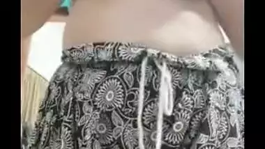 Indian aunty sucks her own finger and strips down in her XXX show