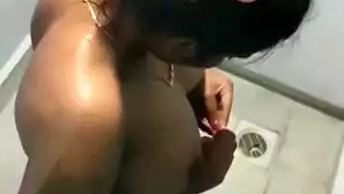 Libidinous Desi wife shows how she puts her pink bra on XXX titties