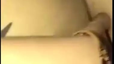 Young gal in red lingerie teases her XXX Desi pussy for the camera