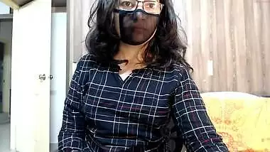 Desi cam girl opens checkered shirt to expose perky tits to XXX fans