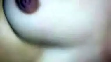 Lewd girl from India advertises her small boobies on camera in close-up