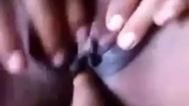 Amateur Desi babe rubs her XXX clitoris while cameraman is fingering ass