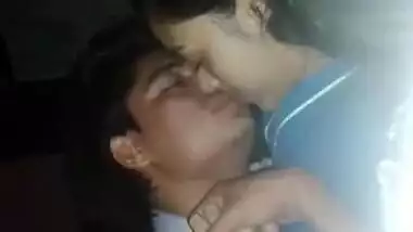 Sleeping Desi babe tries to cover face while sex partner kisses XXX lips