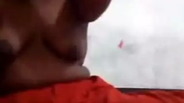 Indian aunty can't hide from camera so she is bound to take boobs out