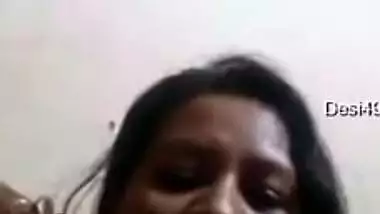 Desi mom simply sits in front of camera and talks with serious face