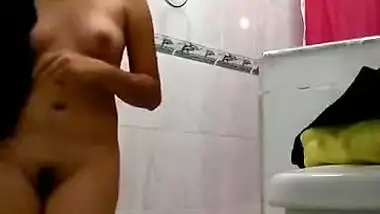 During relax in bathroom naked Desi teen records quick solo XXX clip