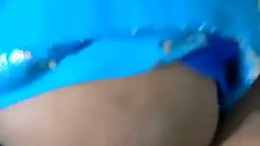 Desi chudai of Bhabhi lying on bed in blue saree