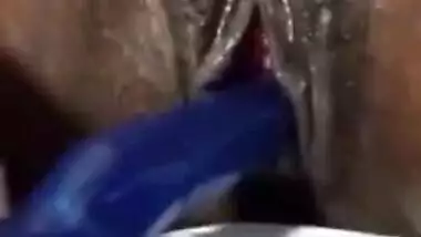 Excited Indian girl needs no sex when blue XXX toy is at hand