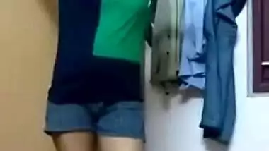 Indian girl doesn't know what to wear and flashes body parts in homemade porn