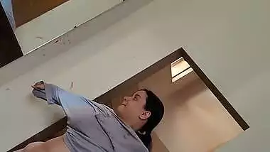 Chubby wife wearing dress after nude bath caught