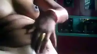Desi masturbating with a cooking stick