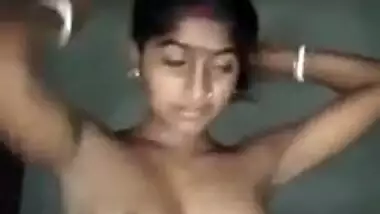 Young village slut strips to show her perky Desi tits for XXX video