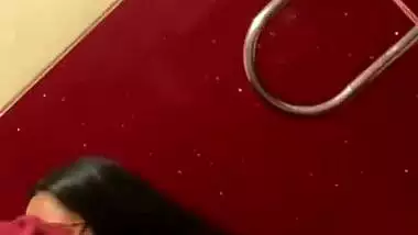 Chubby girl gives an outdoor blowjob in a cinema theatre