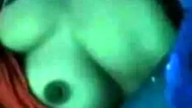 Desi woman hides under the blanket to show XXX tits on video call