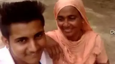 Boy and Desi MILF smile on camera thinking about upcoming porn video