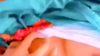 Desi wife shows off small breasts and hairy cunt in online XXX show