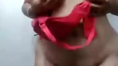 Desi wife performs a sex show flashing her XXX sized boobs on camera