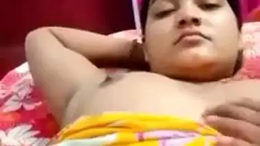 Desi fatty poses in XXX clip with young man who plays with her tits
